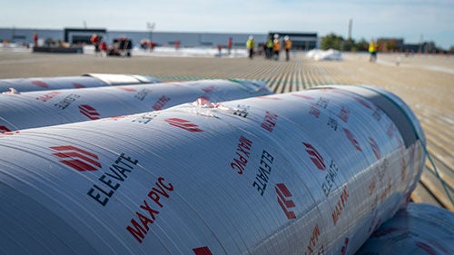 A large white roll of commercial roofing material
