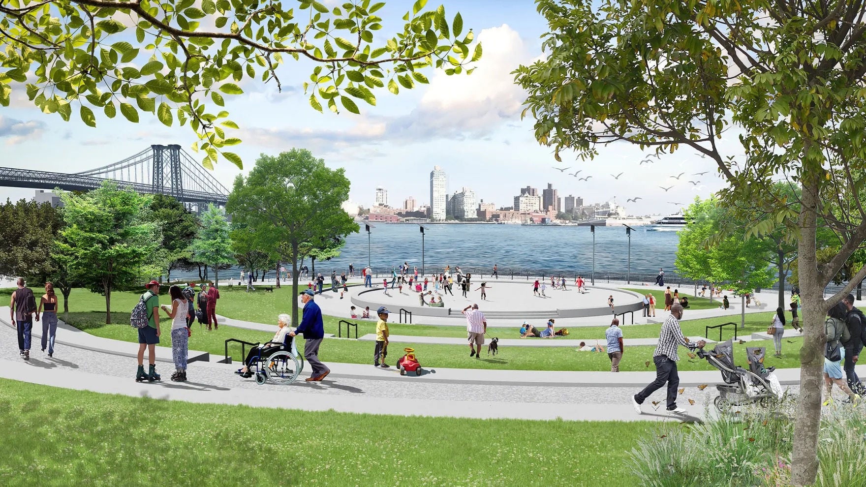 A variety of people walking, skating, and sitting in a modern park space with grass and trees