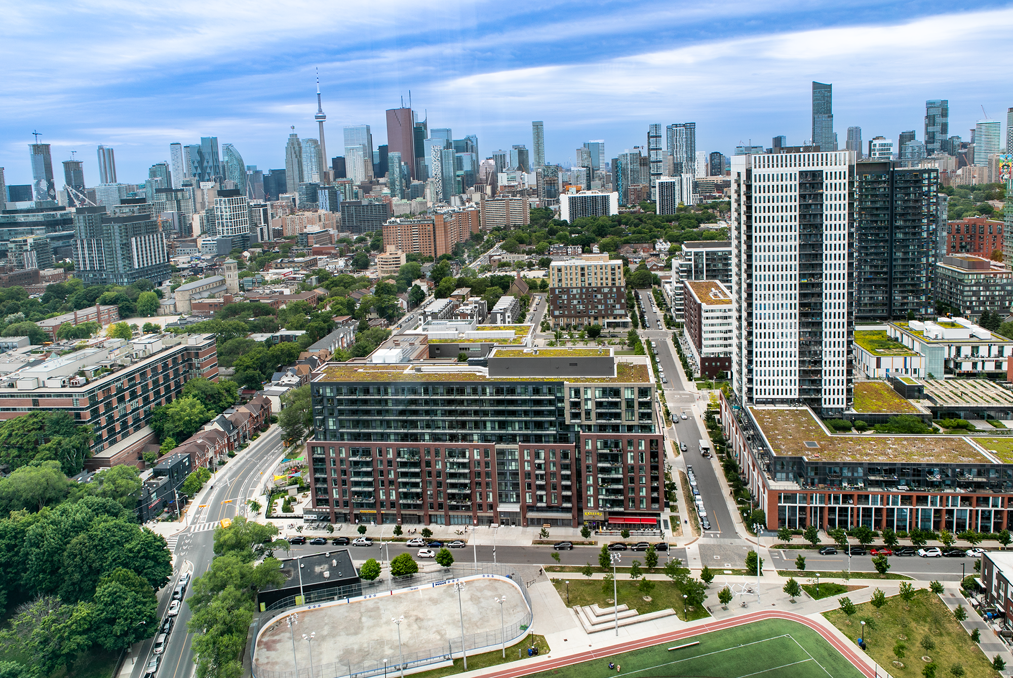 A large cityscape seen extending off into the distance during daytime.