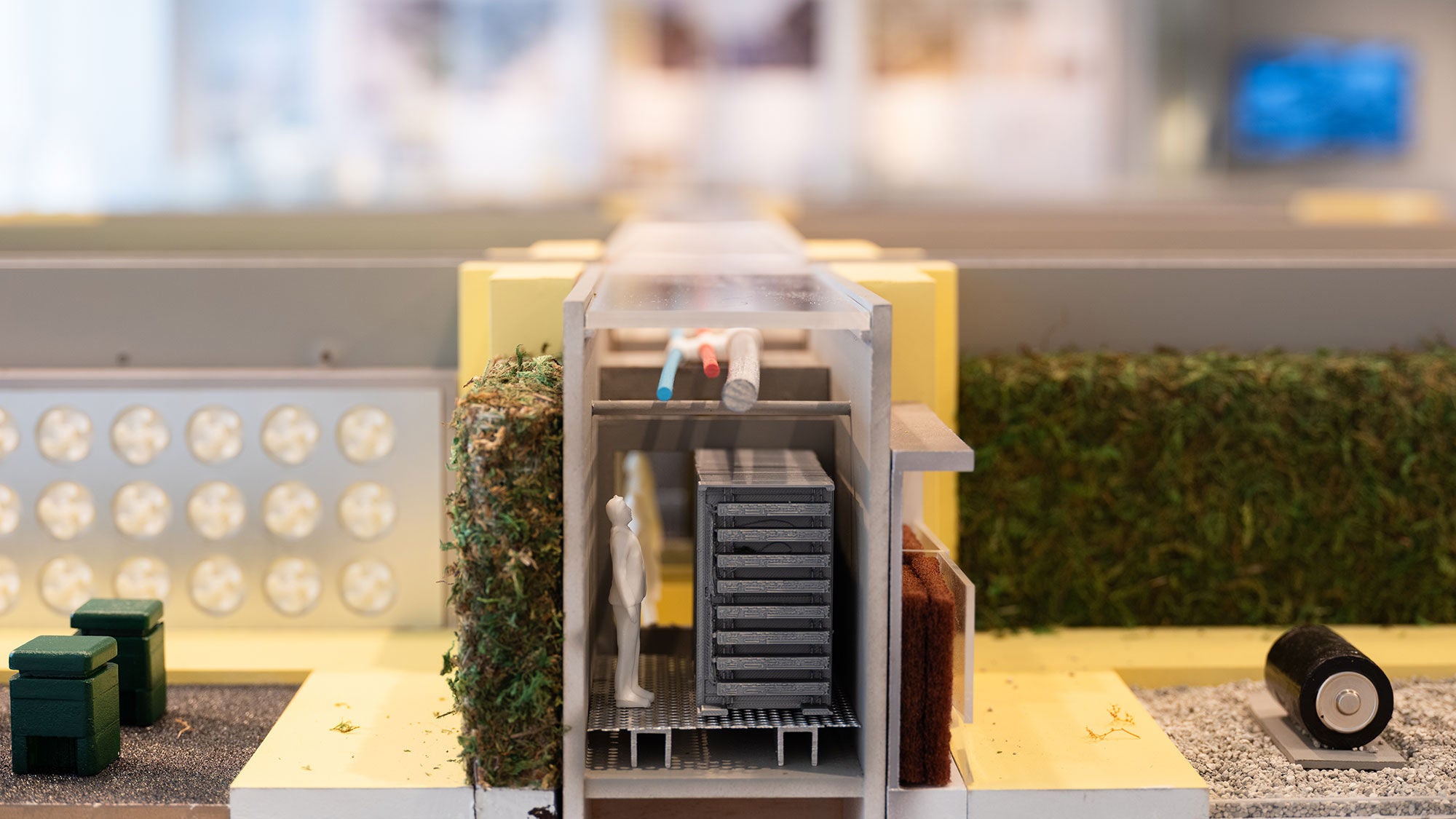 A model of a data center where waste heat is used to grow food, and in-between spaces provide places for community activities