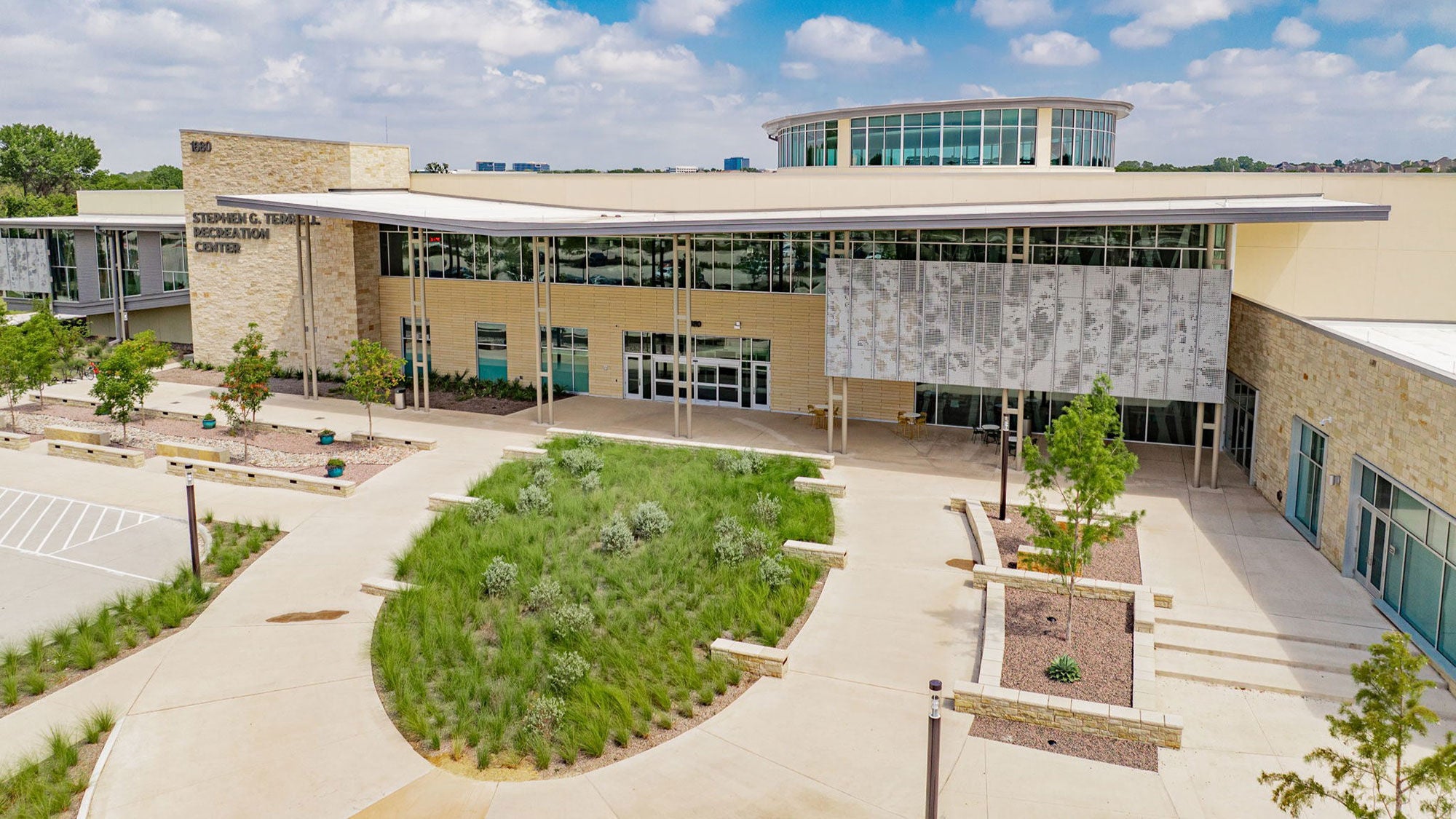 High-angle view of the Stephen G. Terrell Recreation Center in Allen, TX, showing modern design and landscaping.