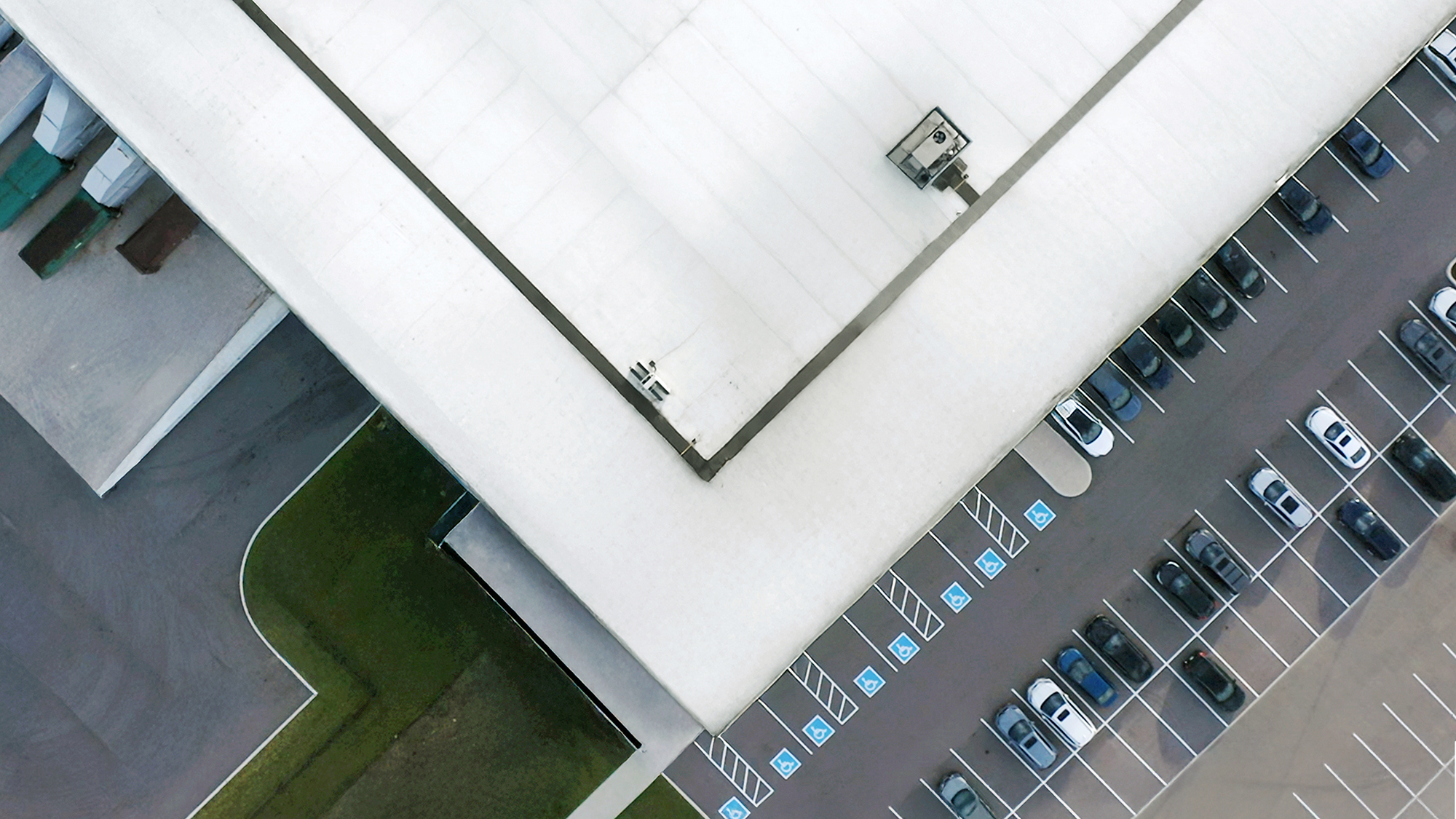 A warehouse surrounded by fields