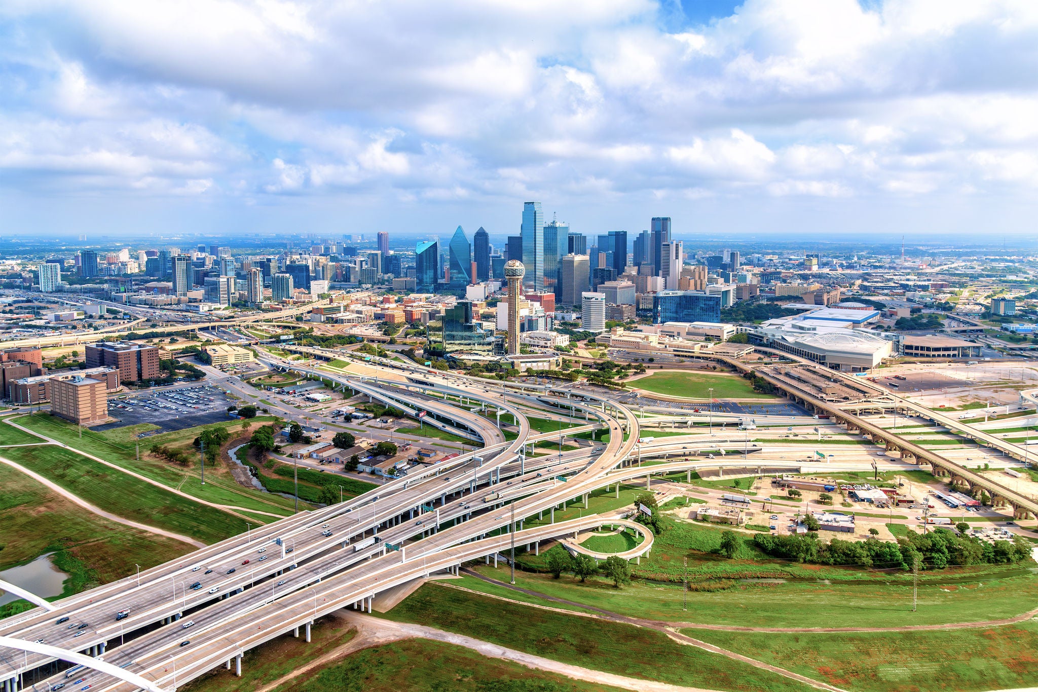Cityscape with highway in foreground