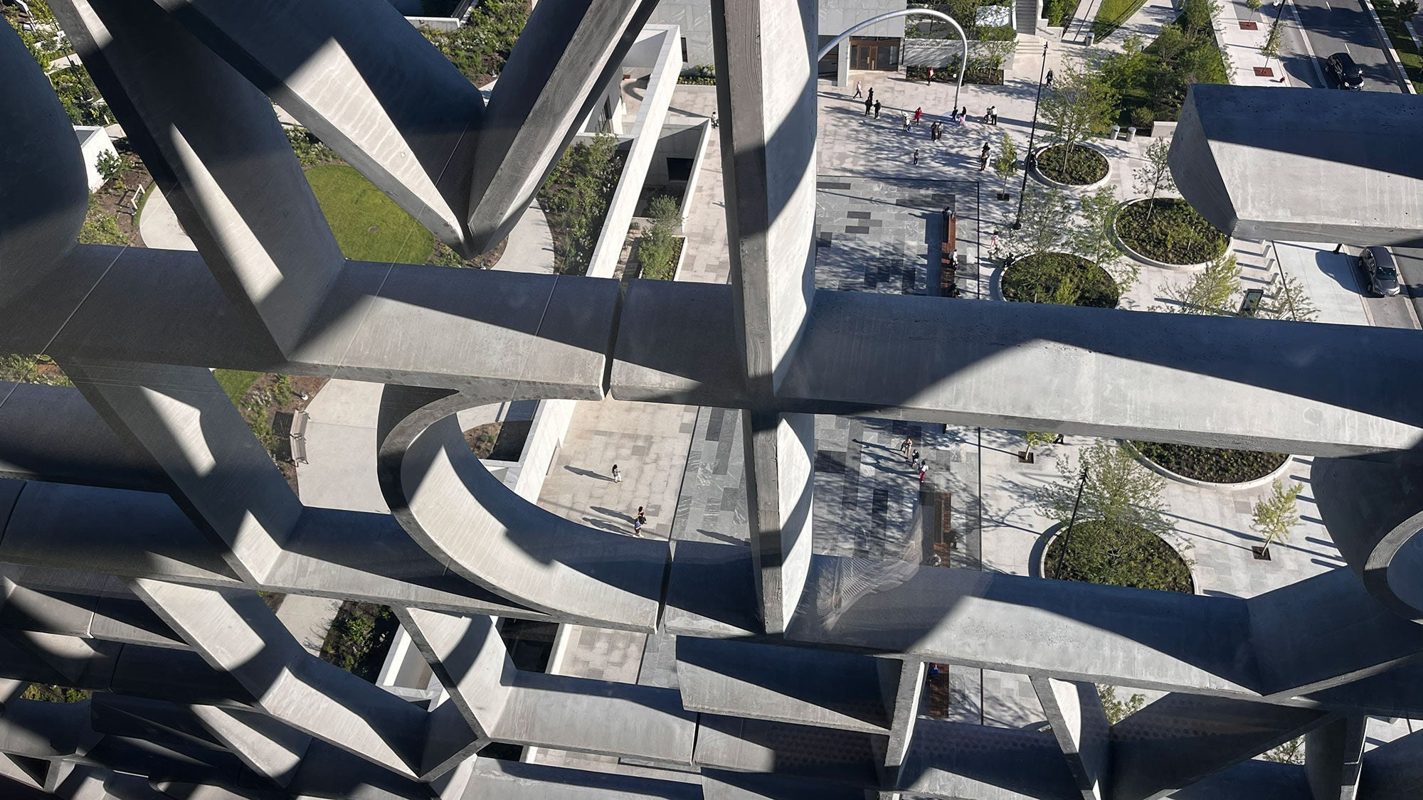 Looking down at the grounds through the Obama Presidential Center's lettered facade. 