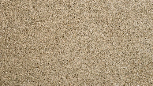 A close-up of a sand-like concrete finish